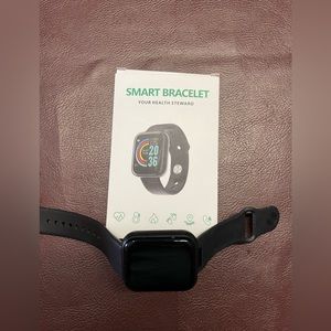 2 fitness trackers - 1 in package, 1 out.